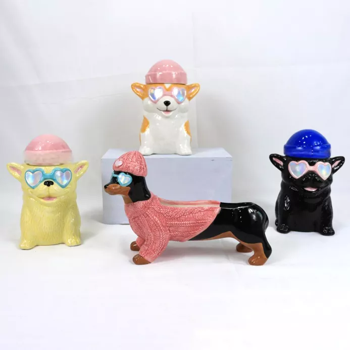 Eläinkeraaminen kynttilänjalka